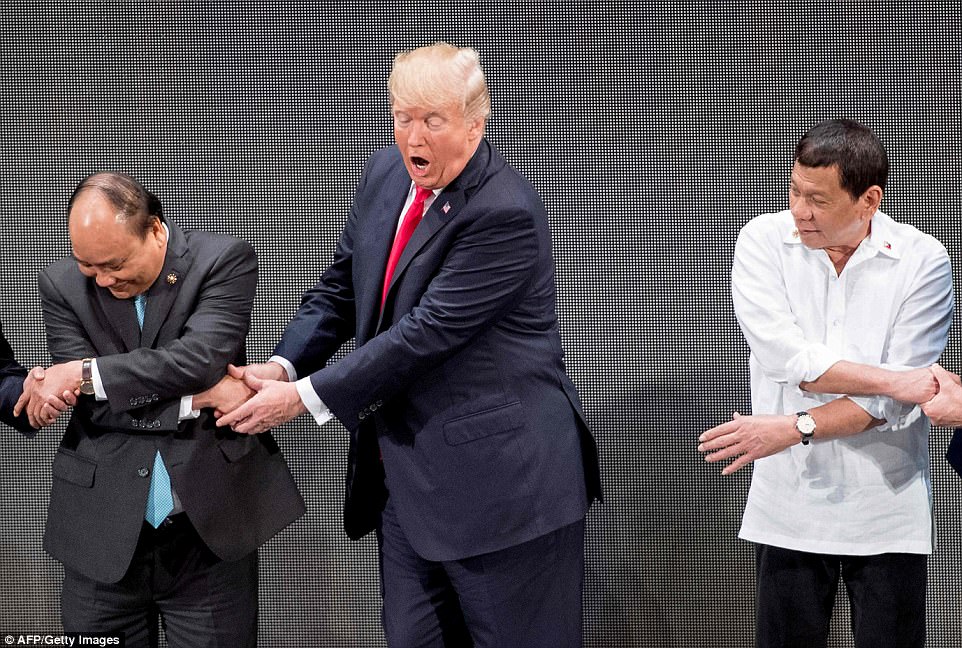Name:  464A575D00000578-5076231-I_GOT_IT_Trump_grimaced_as_he_swapped_hands_with_Vietnam_s_Prime-a-39_1.jpg
Views: 237
Size:  202.7 KB