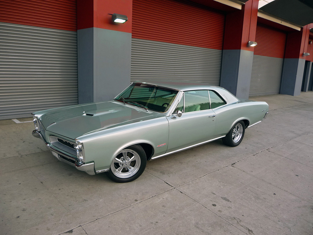 Name:  1966PontiacGTO.jpg
Views: 512
Size:  360.0 KB