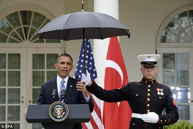 Name:  obama marine rain.jpg
Views: 632
Size:  25.7 KB